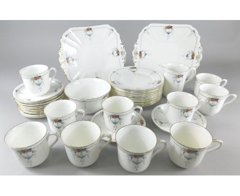A Shelley porcelain Wreaths of Fruit pattern part tea service, decorated with fruit, leaves, swags etc., hand written number 