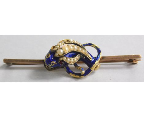 A Chinese dragon brooch, with enamel, seed pearl and red stone dragon, on yellow metal bar, unmarked