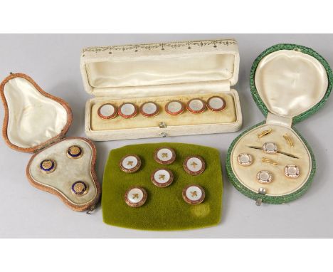 Four sets of collar studs, to include three mother of pearl and enamel design studs and a set of blue enamel and floral engra