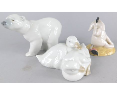 A Nao figure group, of two recumbent geese, 11cm wide, Royal Doulton Eeyore's Tail WP7 figure and a Lladro Daisa figure of a 