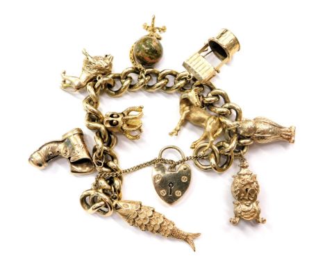 A 9ct gold charm bracelet, mounted with various 9ct and yellow metal charms to include a globe, horse, articulated fish, lion
