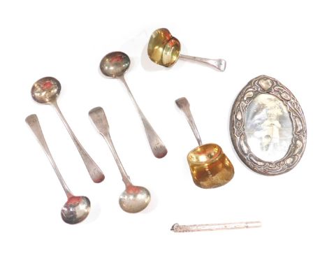 A group of silver Samuel Pemberton, comprising two silver Victorian caddy spoons, a set of three Victorian silver fiddle patt
