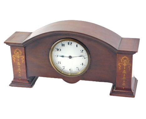 An early 20thC inlaid Edwardian mantel clock, the white enamel dial with Arabic numerals, 31cm wide. 