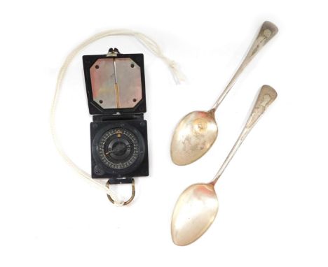 A military magnetic compass mark I, and two silver plated fiddle pattern serving spoons. (3)