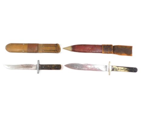 Two horn handled hunting knives, one inscribed Manson Sheffield, with tan leather scabbard, 36cm long, and another in brown l