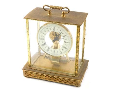 A German Kieninger and Obergfell magnetic pendulum electric mantel clock, in gilt brass case, 23cm high. 