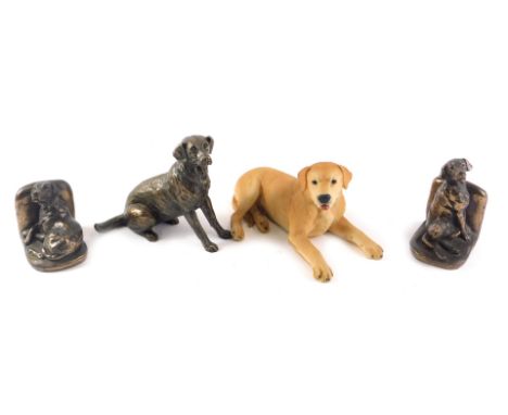 A North Light sculpture of a Labrador, dated 1988, pair of Labrador shaped bookends, and a further resin sculpture. (4) 