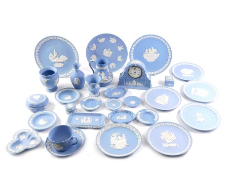 A quantity of Wedgwood blue Jasperware, to include mantel clock, plates, dishes, vases, etc. (1 tray)