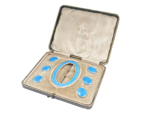 A George V silver and enamel buckle and button set, with light blue enamel detail, comprising buckle and six buttons, maker D