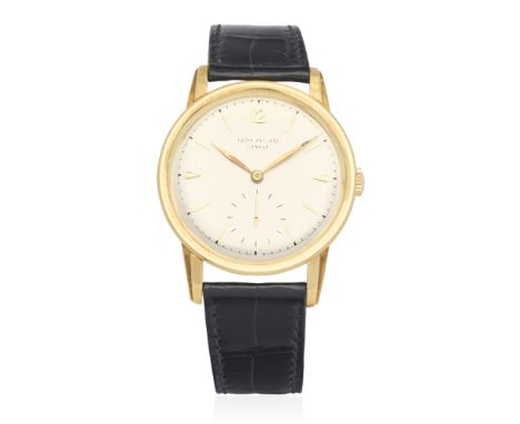 Patek Philippe. An 18K gold manual wind wristwatchModel: CalatravaReference: 2452Date: Manufactured 1955, sold 4th June 1958M