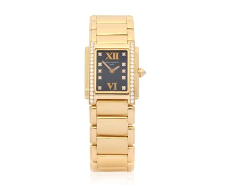 Patek Philippe. A lady's 18K rose gold diamond set quartz bracelet watchModel: Twenty 4Reference: 4908/11Date: Circa 2010Move