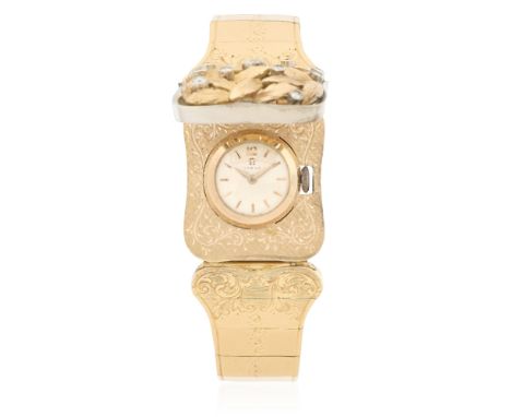Omega. A lady's 18K gold diamond set manual wind wristwatch with concealed dial and associated case and braceletDate: Circa 1