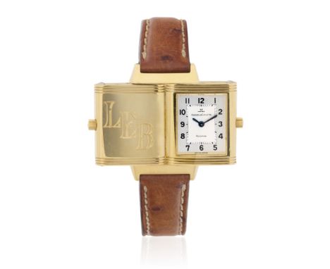 Jaeger-LeCoultre. A lady's 18K gold quartz reversible rectangular wristwatchModel: ReversoDate: Circa 2008Movement: Jewelled 
