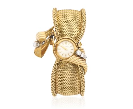 Jaeger-LeCoultre for Kutchinsky. An 18K gold diamond set manual wind bracelet watch with concealed dialDate: London Hallmark 