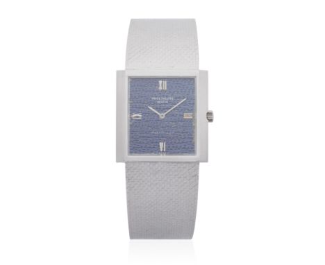Patek Philippe. An 18K white gold manual wind bracelet watch retailed by Tiffany &amp; Co.Model: GondoloReference: 3571 1Date