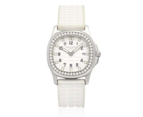 Patek Philippe. A lady's stainless steel diamond set quartz wristwatchModel: AquanautReference: 4961Date: Circa 2000Movement: