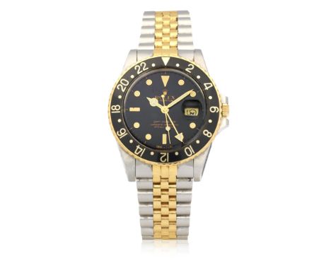Rolex. A stainless steel and gold automatic calendar bracelet watch with dual time zonesModel: GMT-MasterReference: 16753Date