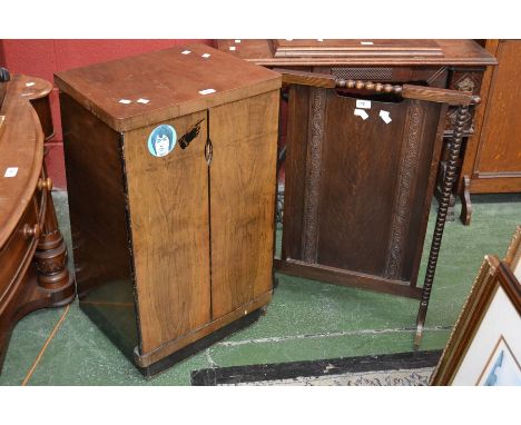 A 1940's oak firescreen; a 1950's side cabinet (2)
