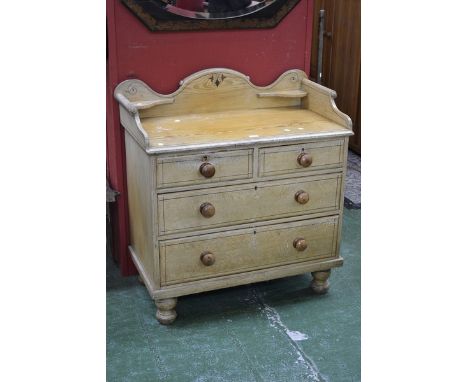 A Victorian pine washstand chest, shaped three quarter gallery, painted stringing and floral decoration, moulded oversailing 
