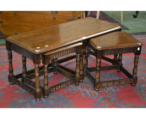 An Ercol style nested coffee table.