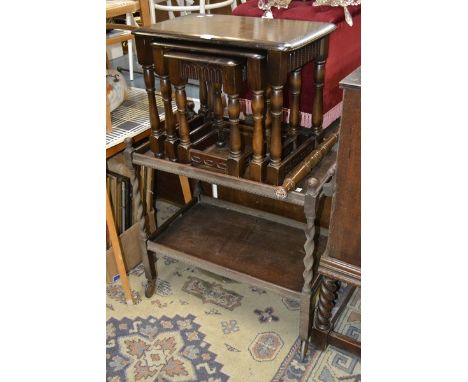 An Ercol style nest of three tables; an oak barley twist tea trolley. (2)