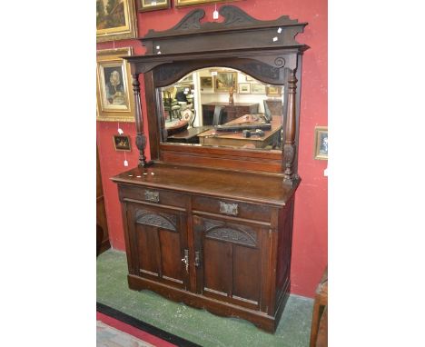 An Art Nouveau mahogany mirror back sideboard, carved swan neck pediment, bevel edge cresting arch mirror flanked by turned a