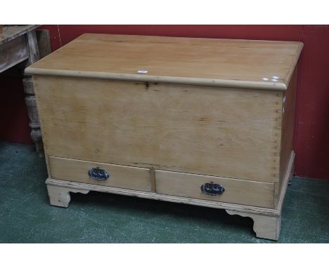 A Victorian pine blanket chest, with two single drawers, bracket feet