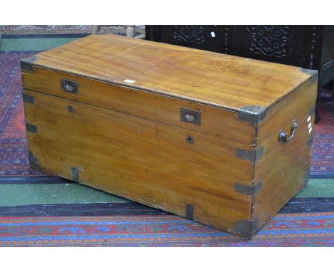 A brass bound camphor wood trunk with campaign handles. 46cm high x 101cm x 50cm.
