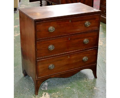 A George III mahogany chest of three long drawers, oval escutcheons, swing handles, spreading bracket feet. 78cm high x 73cm 