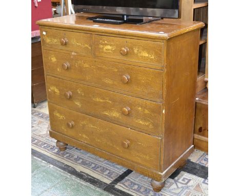 A Victorian scumbled pine chest of long drawers, two short over three long drawers