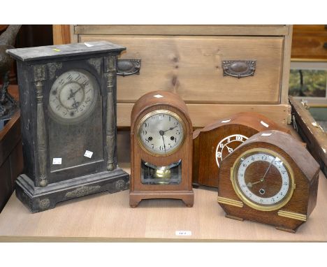An oak mantel clock;others similar; an Oriental mantel clock in a traditional Chinese decoration.