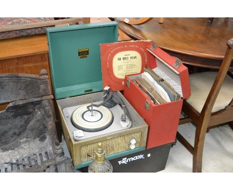 A Dansette Major record player and records.