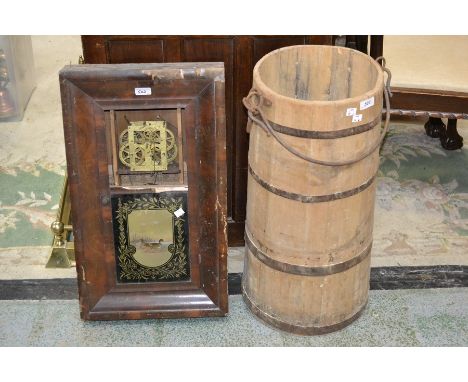 A coopered butter churn, swing handle, 68cm high; an American wall clock (2)