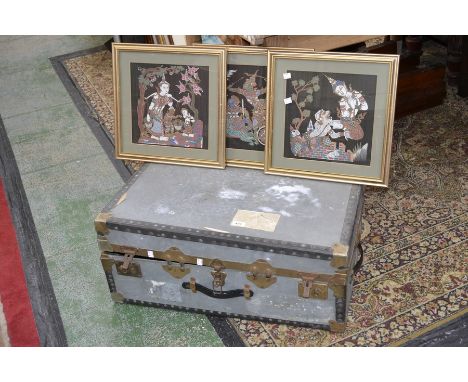 A brass mounted travel trunk; three Indonesian style pictures, framed