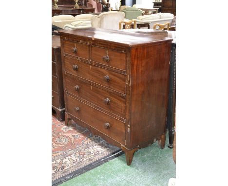 A Victorian mahogany crossbanded chest, two short cockbeaded drawers over three graduated long, shaped apron, bun handles, br