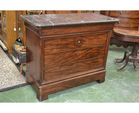 A French flame mahogany secretaire chest, oversailing variegated grey marble top, compartmentalised long drawer over fitted s