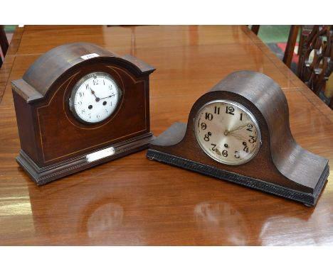 An Edwardian inlaid mahogany arch topped mantel clock, white enamelled dial, Arabic numerals, minute track, twin winding hole