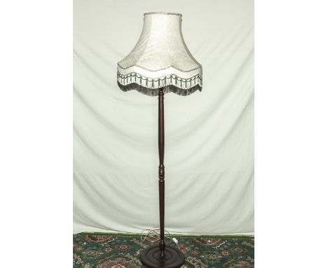 A standard lamp and shade