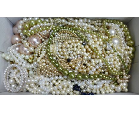 A collection of mixed pearl necklets and bracelets 
