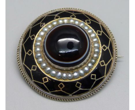 A Victorian bull's eye agate, seed pearl and enamel mourning brooch, 4.1cm 