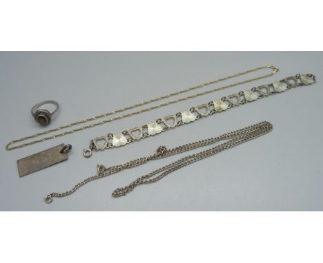 A fine 9ct gold chain, 1.5g, and silver jewellery including a ring, ingot, bracelet and a chain, 19g