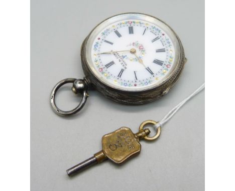 A .935 silver cased fob watch with enamel dial marked Kay &amp; Company, with key 