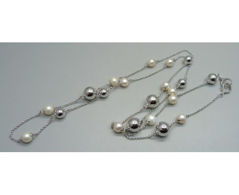 A Georg Jensen silver and cultured pearl guard chain, 39g, approximately 97cm 