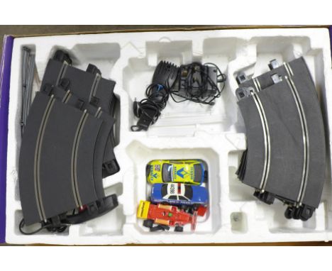 A Scalextric set containing track and cars, incomplete, boxed **PLEASE NOTE THIS LOT IS NOT ELIGIBLE FOR POSTING AND PACKING*