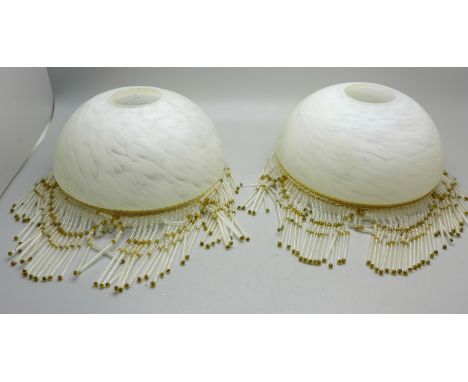 A pair of Art Deco style glass light shades, compacts, a cameo, etc. 