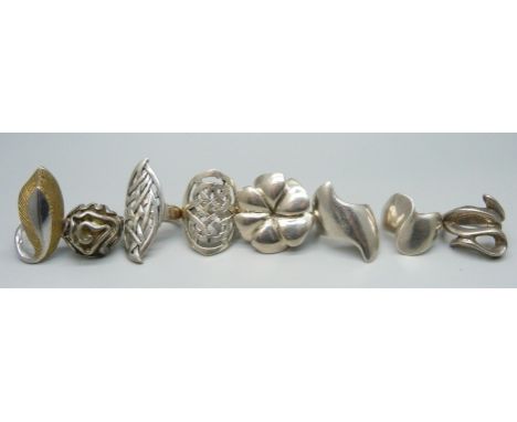Seven silver large chunky rings, and one unmarked white metal ring, up to 38mm, 71.g 