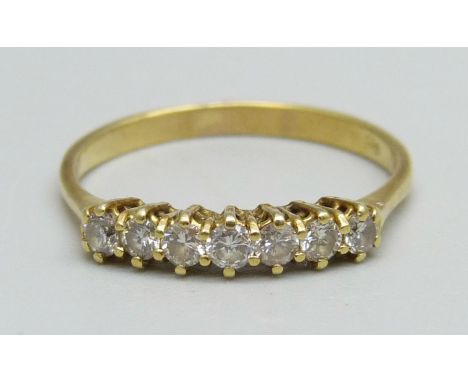 An 18ct gold and seven stone diamond ring, 2.3g, Q 