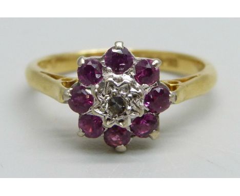 An 18ct gold, diamond and ruby cluster ring, 3.4g, M 