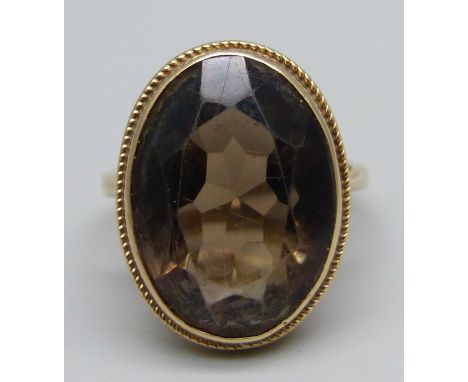 A 9ct gold and smoky quartz ring, 4.3g, M 