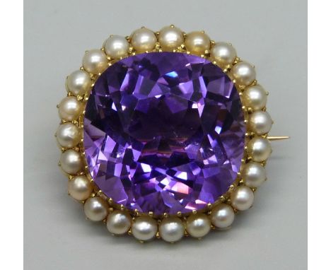 A 15ct gold brooch set with a cushion cut amethyst and seed pearl border, 11.7g, amethyst approximately 1.8 x 1.8cm, small in